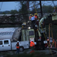 Repair crews inspect damages at the site of a train derailment accident May 13, 2015, in Philadelphia.
Alex Wong/Getty Images